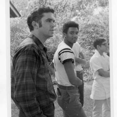 Joseph Daoust, S.J. with elementary students from 17th and Girard neighborhool in Philadelphia on SJC campus (?). This may have been part of SJC Commune outreach effort during summer 1968.
