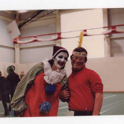 Student dressed as clown and participant at Hand-in-Hand event, a community service/outreach project.