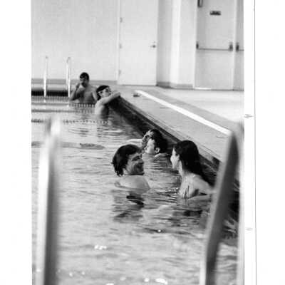 Students swimming in pool in Sports Complex.