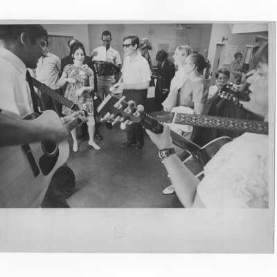 Pax Romana's 20th World Plenary Assembly meets at Saint Joseph's College, August 1968. Group of guitarists and singers practice before liturgy.