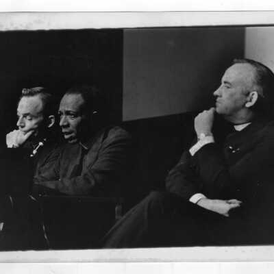 Terrence Toland, S.J., with W. Wilson Goode (Philadelphia Council for Community Advancement?) and another individual.