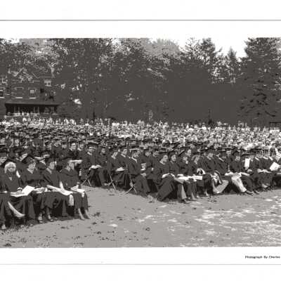 View of audience and graduates on Gest Lawn during 1980 graduation/commencement.