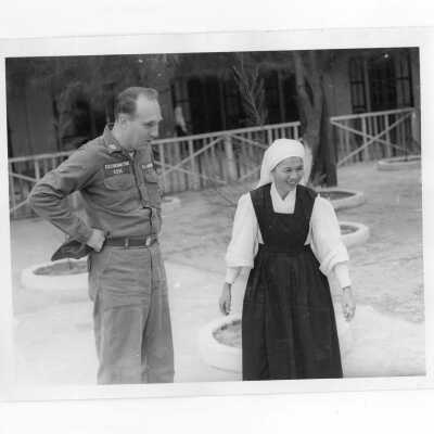 U.S. soldier with Vietnamese nun, Vietnam Orphanage project.