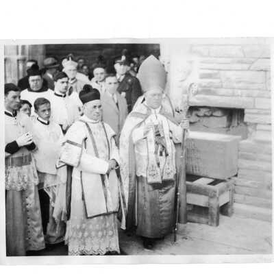 Dennis Cardinal Dougherty and Monsignor Thomas F. McNally leading procession during dedication of Barbelin Hall and blessing of cornerstone.
