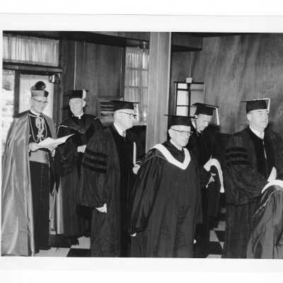 J. Joseph Bluett, S.J., John Cardinal Krol, and others processing to 1961 graduation/commencement ceremony.