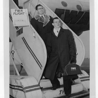 Two members of Villiger Debating Society, Joseph T. English and Frederick W. Floyd, boarding plane for debates in Ireland and England.
