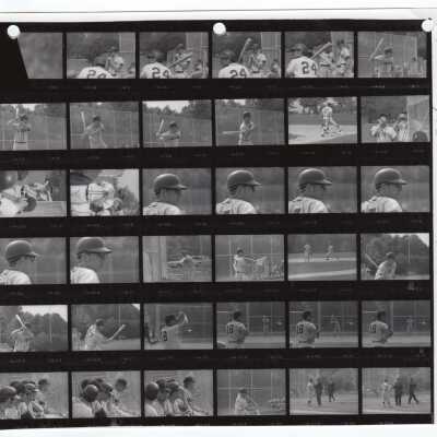 Photos of players on 1969 men's baseball team during a game.