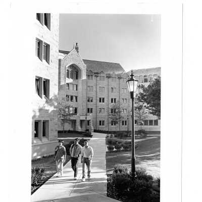Students walking by front entrance of McShain Hall.