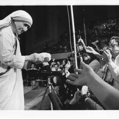 Mother Teresa at bread breaking ceremony during International Eucharistic Congress, symposium on hunger, August 2, 1976, held at Philadelphia Civic Center.