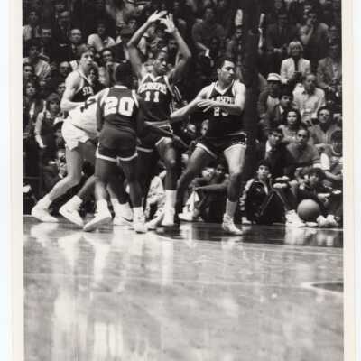 Men's Basketball game with player Maurice Martin