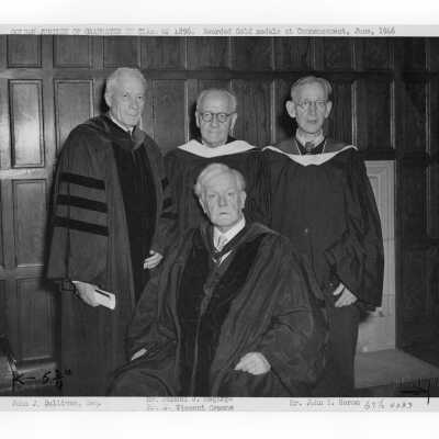 Four graduates from the class of 1896 receiving gold medal awards at 1946 graduation/commencement ceremony: John J. Sullivan, Samuel J. Magarge, John T. Heron, J. Vincent Crowne.