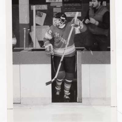 Men's ice hockey team in game.