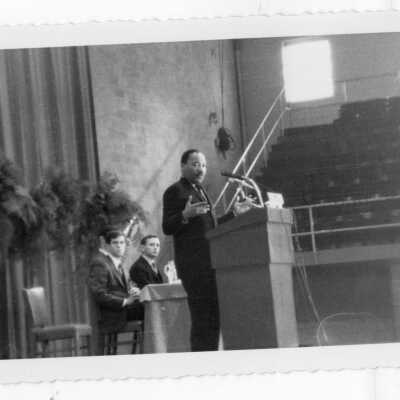 Dr. Martin Luther King, Jr. delivering speech at Saint Joseph's College, October 26, 1967 in Field House.