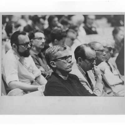 Pax Romana's 20th World Plenary Assembly meets at Saint Joseph's College, August 1968. View of audience, including Jerome Coll, S.J. and Thomas Melady, listening to Lecture.