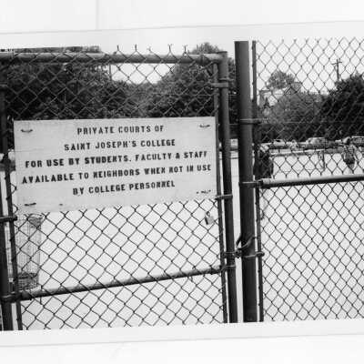 Gate to Saint Joseph's College tennis courts.