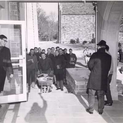 Students moving books from Barbelin into new Drexel Library.