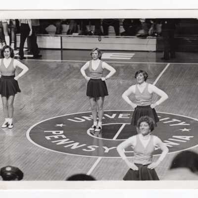 Women cheerleaders at basketball game.