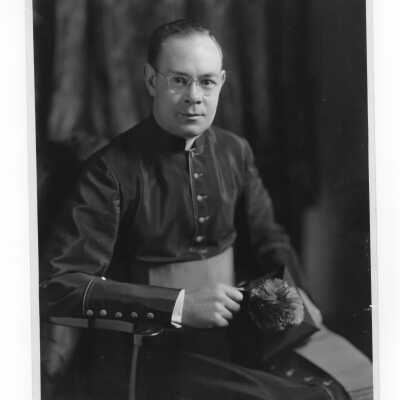 Portrait of Monsignor Hyland, dignitary at 1948 graduation, commencement ceremony.