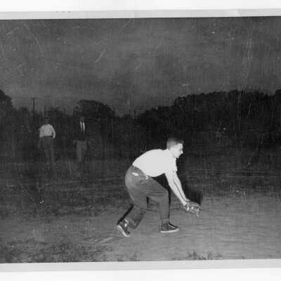 Student from Barry Hall playing baseball.