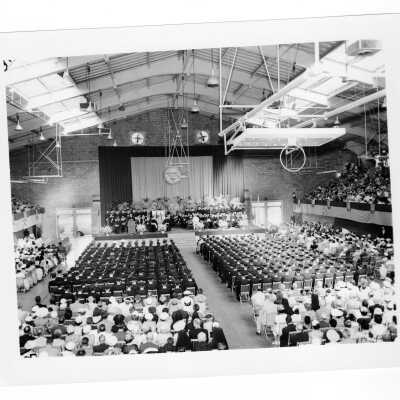 Interior view of 1959 graduation/commencement ceremony in Field House.