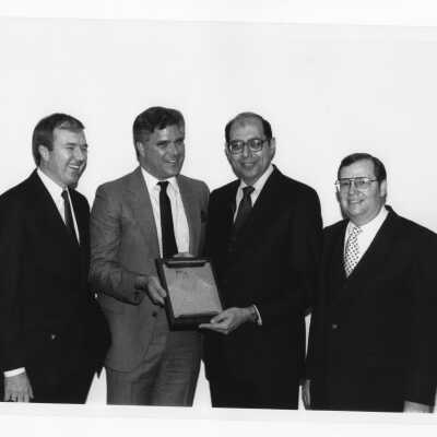 Daniel N. DeLucca, recipient of 1984 Hogan Alumni Award with James P. Gallagher, Michael L. Kempski, and Francis E. Wellock.