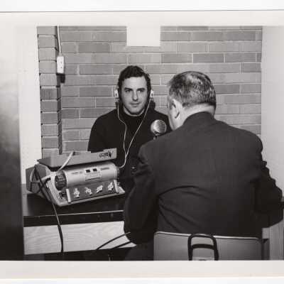 Professor and student in Psychology Laboratory using machine that tests hearing, March 1968.