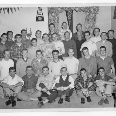 Students of Quirk Hall with Francis J. Emory, S.J.