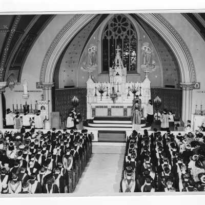 Interior view of Baccalaureate service at Our Lady of Lourdes Church as part of 1948 graduation/commencement service.