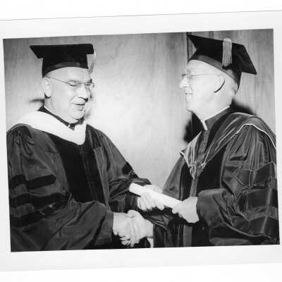 J. Joseph Bluett, S.J., with honorary degree recipient James A. Donnellon, O.S.A. (?), President of Villanova University during 1959 graduation/commencement.