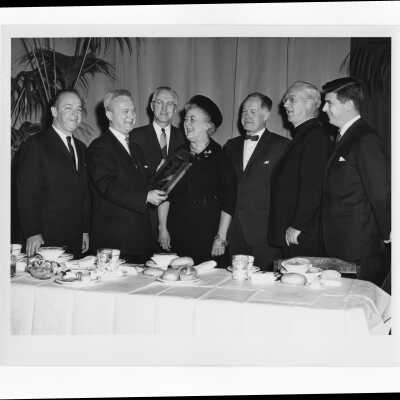 Kathryn Granahan receiving Hogan Alumni Award, March 7,1962 with J. Joseph Bluett, S.J., Mayor James Tate, Governor Bill Cahill, Frank Duff, Bill Berloch watching.