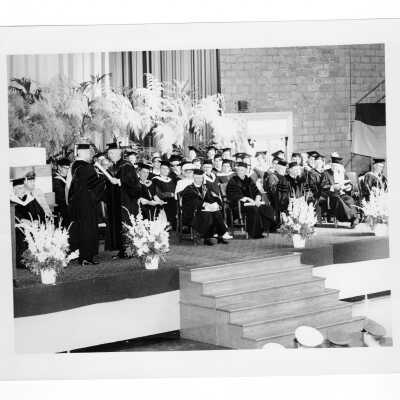 J. Joseph Bluett, S.J., conferring honorary degree during 1959 graduation/commencement ceremony.