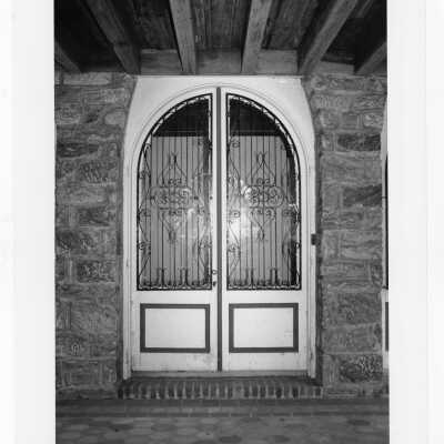Arcade doors of Boland Hall before conversion to classroom space.