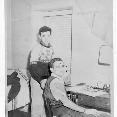 Students from Barry Hall studying in dormitory room.
