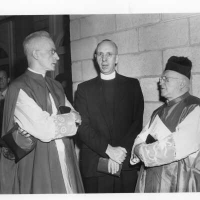 Dennis J. Comey, S.J., and Monsignor Crean and Monsignor McKenna who participated in pontifical mass for centennial celebration held in Field House.