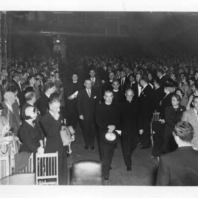 Procession during symposium on industrial relations held October 26, 1951 during centennial celebration. Individuals included: Joseph Hogan, S.J., Fr. Gianera, James Hayes, Leo C. Brown, S.J., Edward G. Jacklin, S.J., Maurice Tobin, Dennis J. Comey, S.J