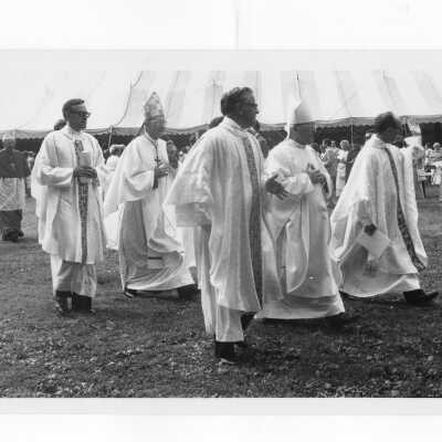 Cardinal John Krol, Donald I. MacLean, S.J., Archbishop Jean Jadot, and Eugene McCreesh, S.J.,(?) in processional aftermass held July 31, 1976, on Gest Lawn prior to academic convocation during SJC 125th anniversary celebration.