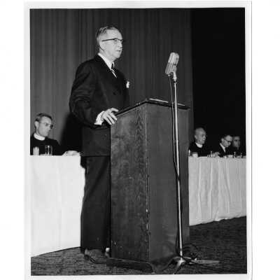 View of speaker and part of head table at alumni communion breakfast, October 28, 1956.