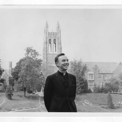 Terrence Toland, S.J., President, SJC, with Barbelin Hall in background.