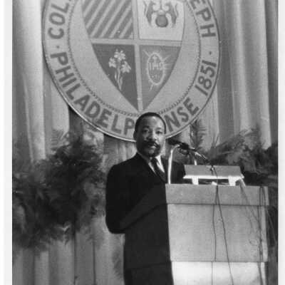Dr. Martin Luther King, Jr. delivering speech at Saint Joseph's College, October 26, 1967 in Field House.