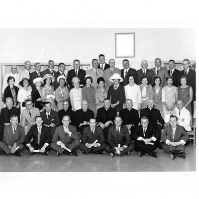 Alumni from class of 1939 and their spouses at reunion, held June 6, 1939. Included are Michael Smith, S.J., H. Baum, S.J., William Maloney, S.J., L. McHugh, S.J., Matthew Sullivan, S.J., Hilferty, Beichl, Horstmann, Bruckheiset, Travers, Brady, Boles