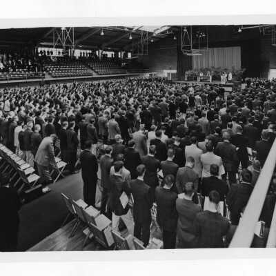 Students attending Mass in Field House.