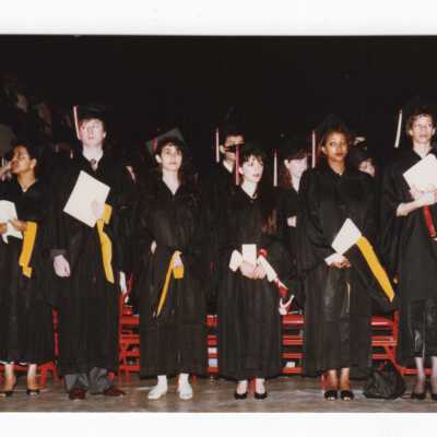 Views of small groups of graduating students during 1990 graduation/commencement.