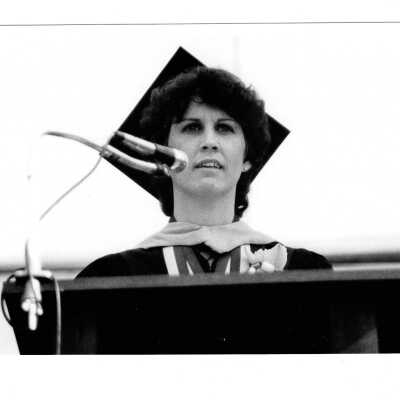 Views of various speakers at graduation/commencement, c. 1984, including Thomas M. McFadden, Dean.