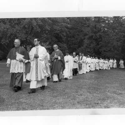 Procession of clergy to Mass held July 31, 1976, on Gest Lawn prior to academic convocation during SJC 125th anniversary celebration.