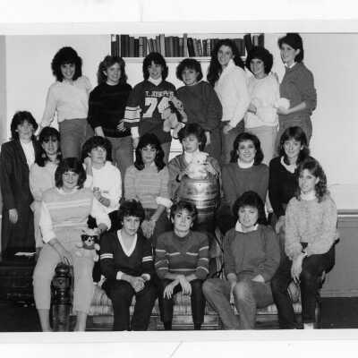 Residents of Quirk Hall with keg in center of group.