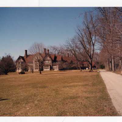 Exterior view of Saint Mary's hall with driveway on side.