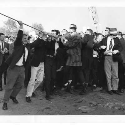 Students pulling down Cardboard College also known as Barbelin Annex.