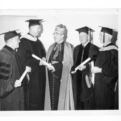 William F. Maloney, S.J., with four recipients of honorary degrees, Bishop John J. Graham, Lee Smith Bickmore, Allan Price Kirby, John Anthony Murphy during 1964 graduation/commencement.