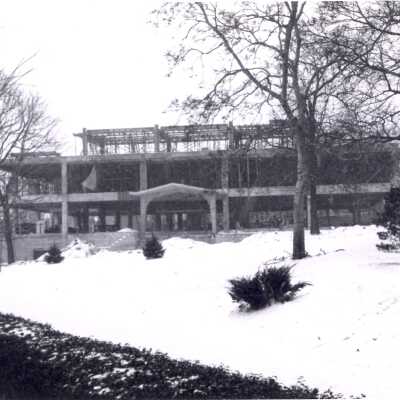 View of Drexel Library under construction with snow on ground.