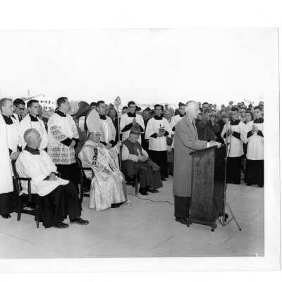 Bellarmine dedication with J. Joseph Bluett, S.J., Rev. Egidio Vagnossi, Rev. Joseph McShea, and Daniel J. Dougherty and others.